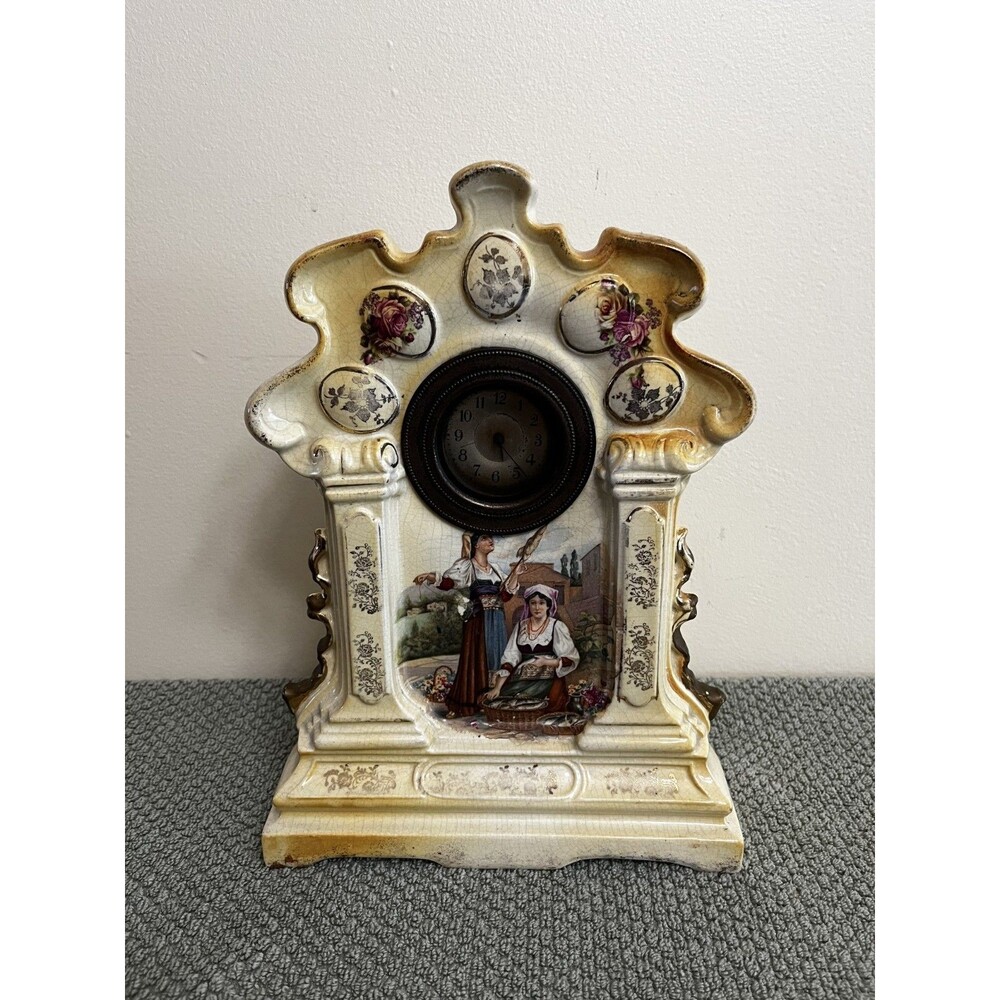 Ceramic Mantel Clock - The Clock Works but needs daily winding .